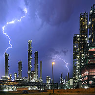 Lightning during thunderstorm above petrochemical industry in the Antwerp harbour, Belgium